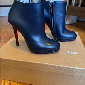 Christian Louboutin Black Heeled Boots with Sleek Silhouette